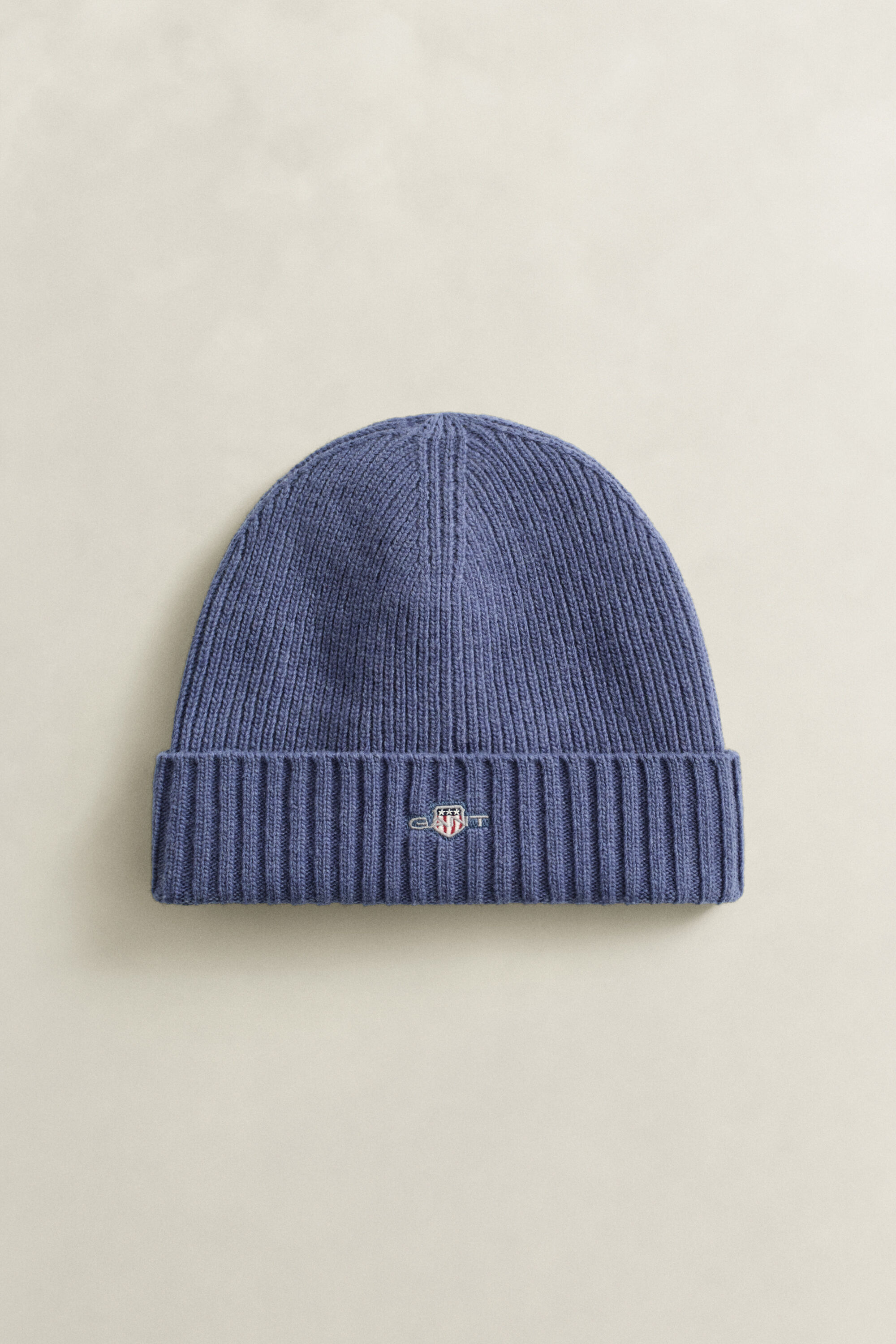 Bonnet en laine avec écusson