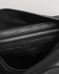 Trousse de toilette en cuir