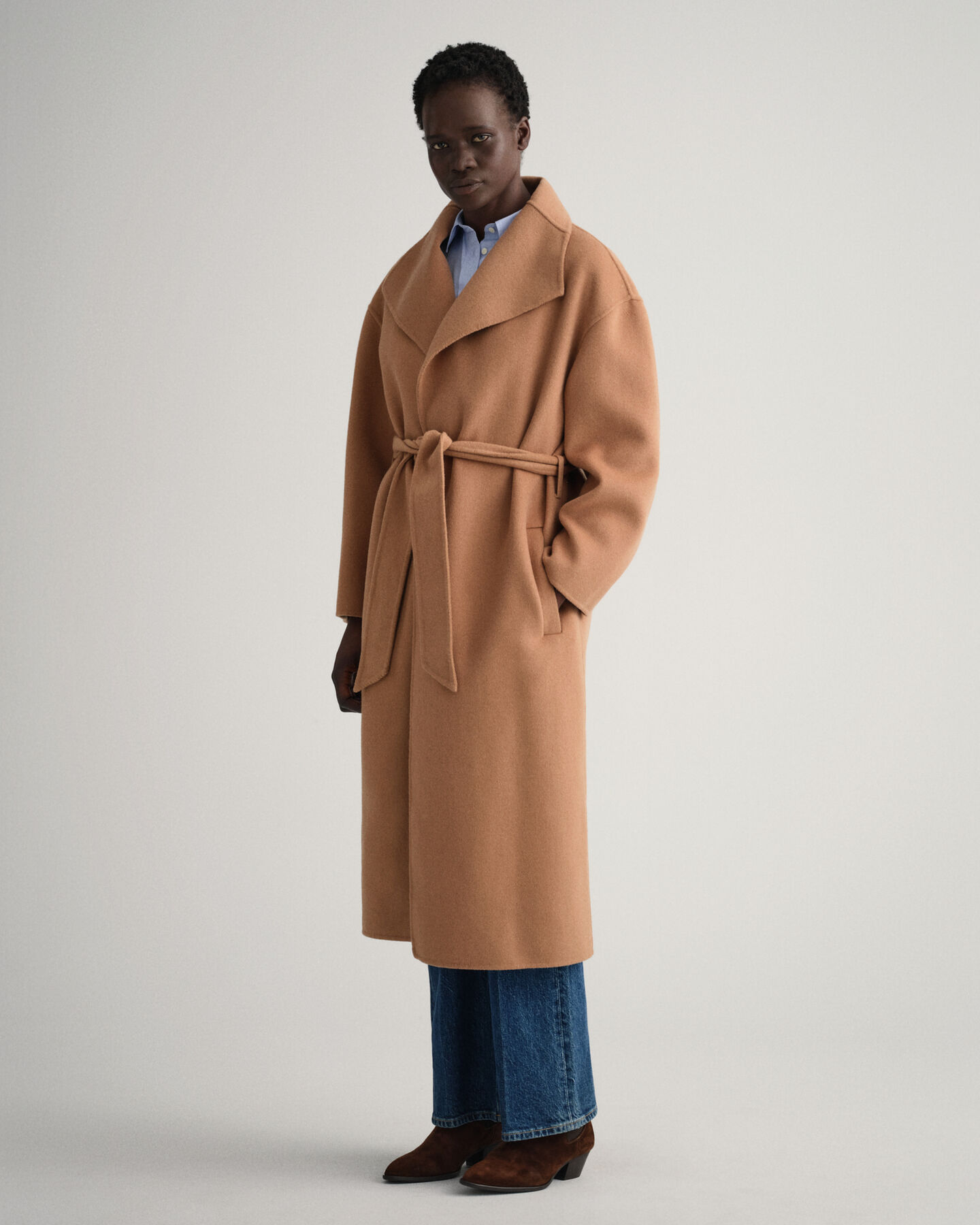 Manteau cousu main avec ceinture