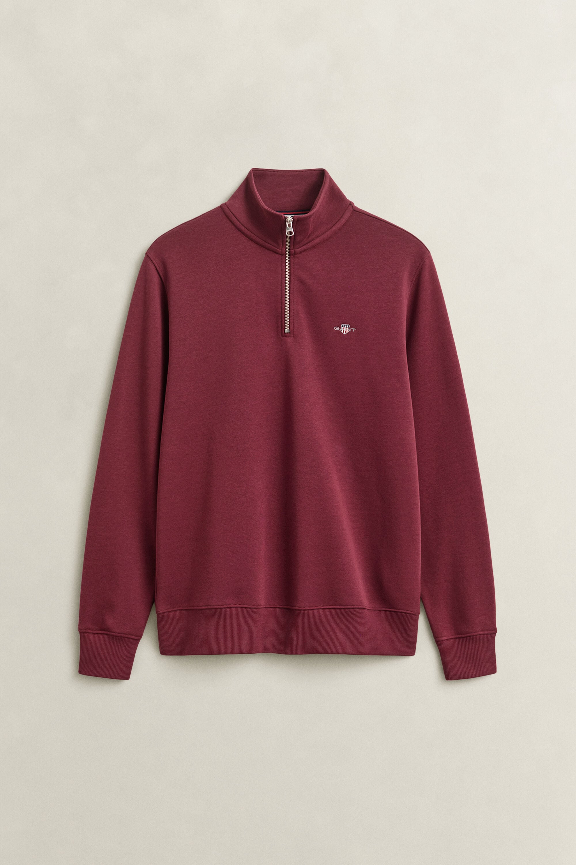 Sweat-shirt à demi-zip avec écusson
