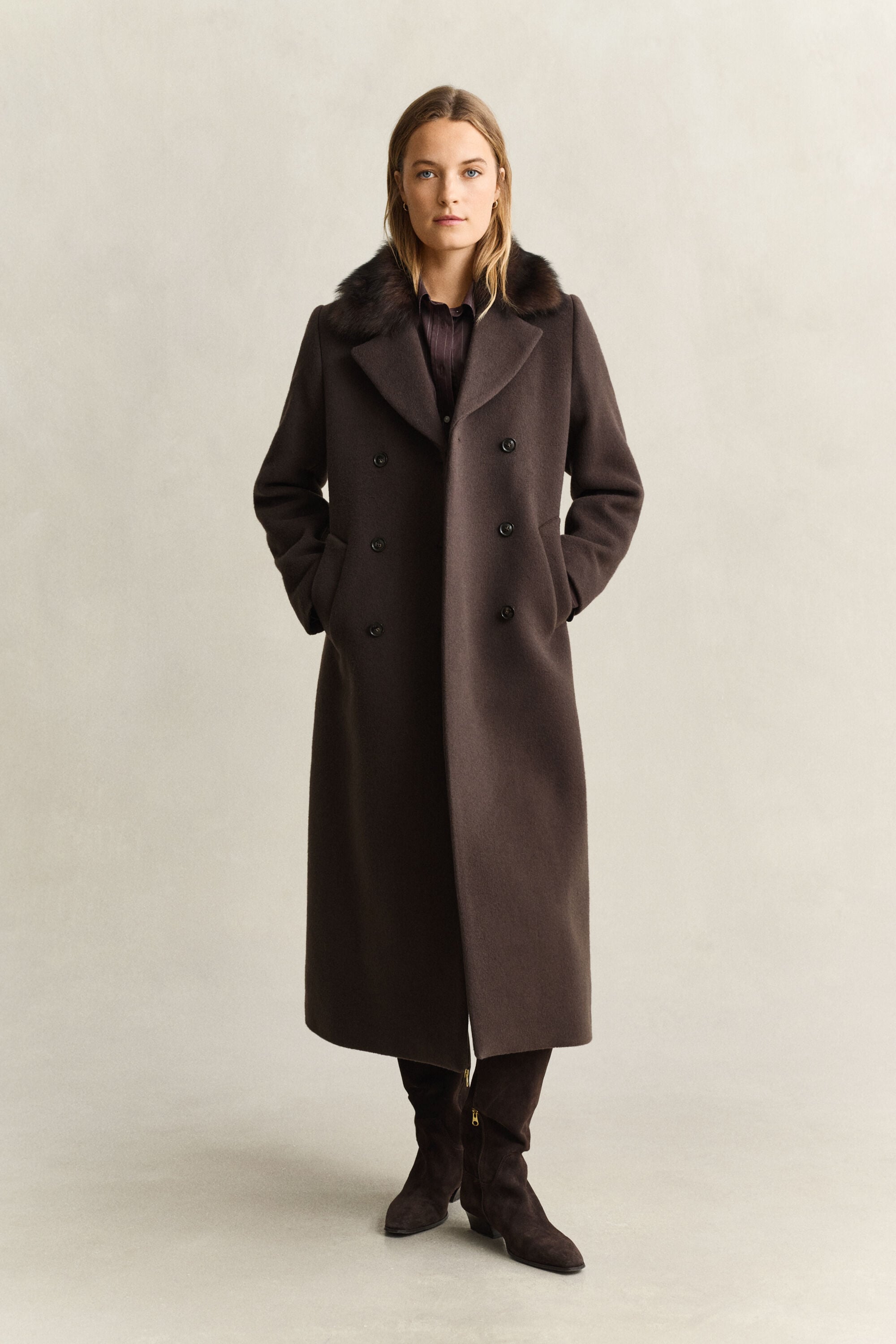 Manteau avec col en peau retournée
