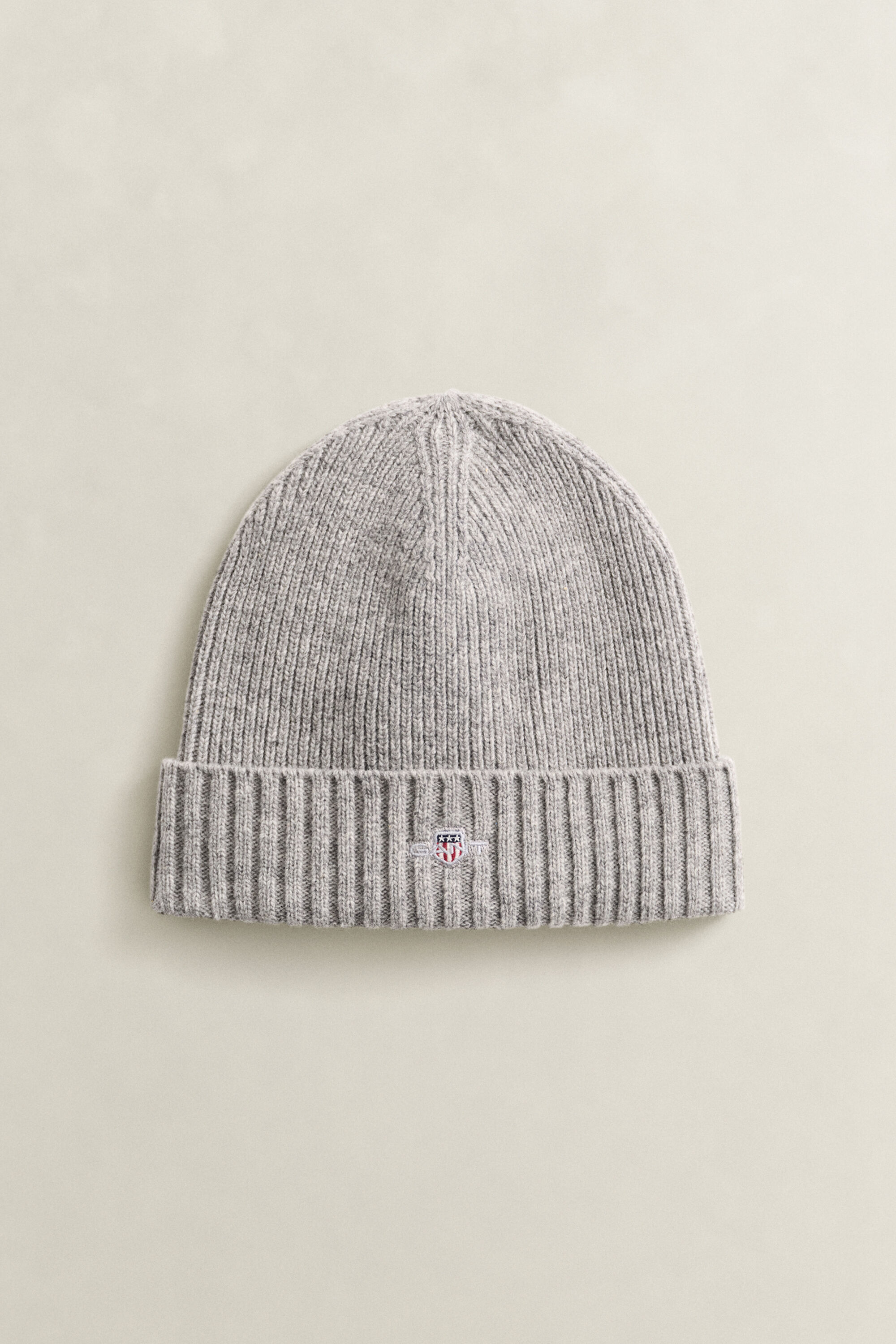Bonnet en laine avec écusson