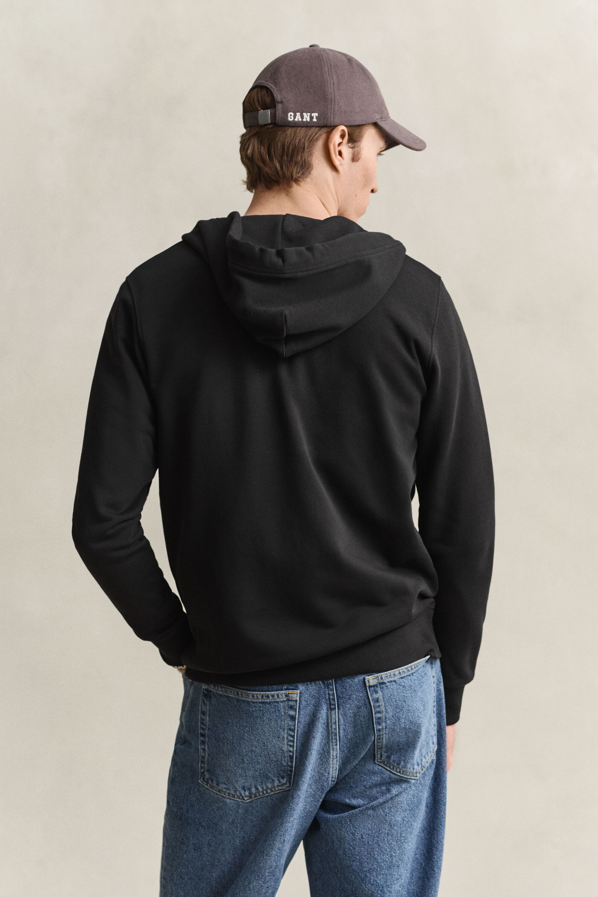 Sweat à capuche zippé avec écusson