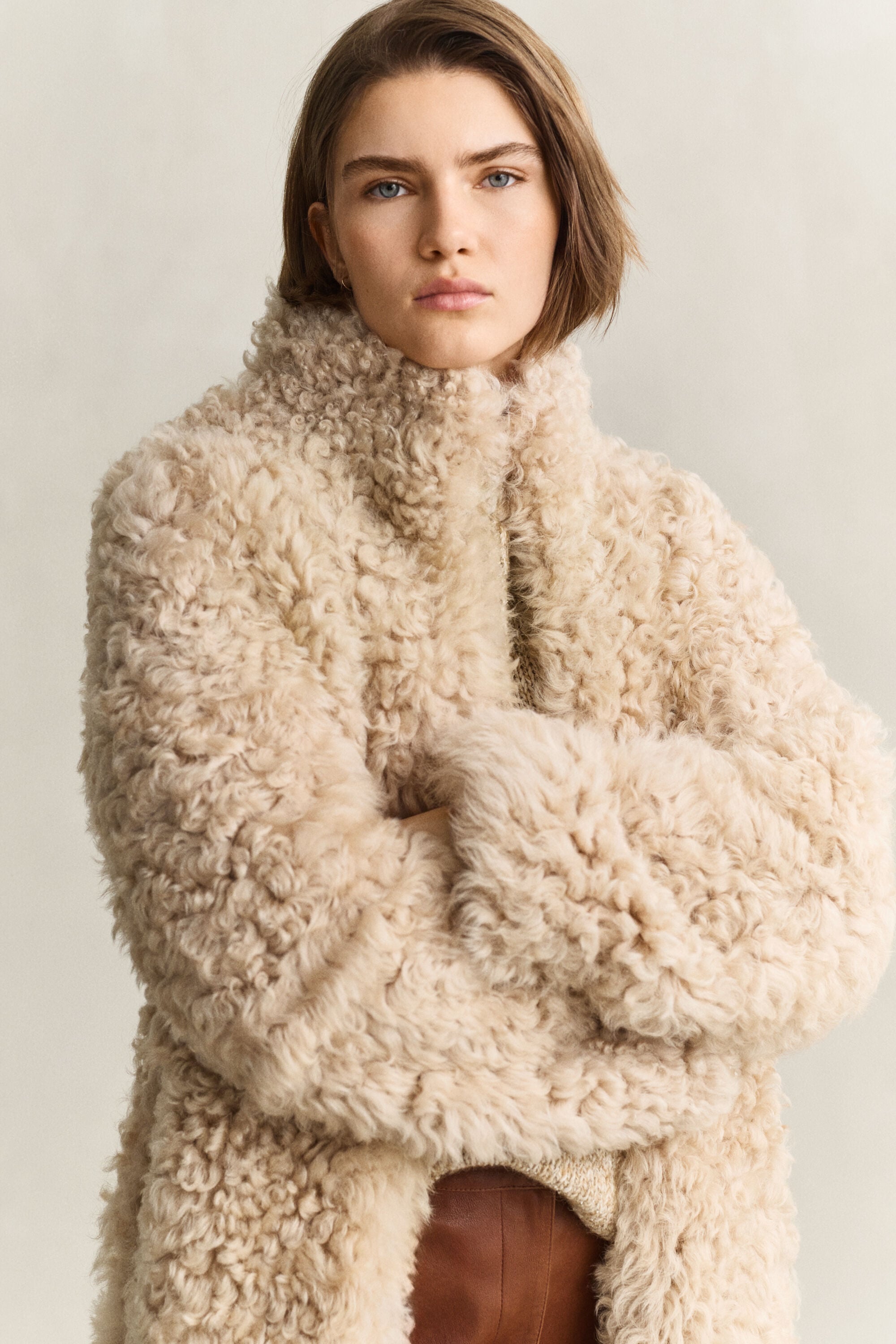 Manteau en peau lainée