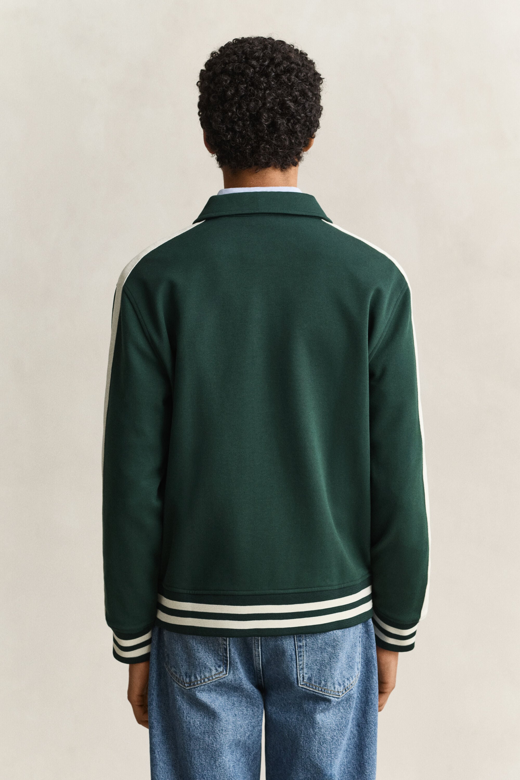 Veste boutonnée en maille interlock.
