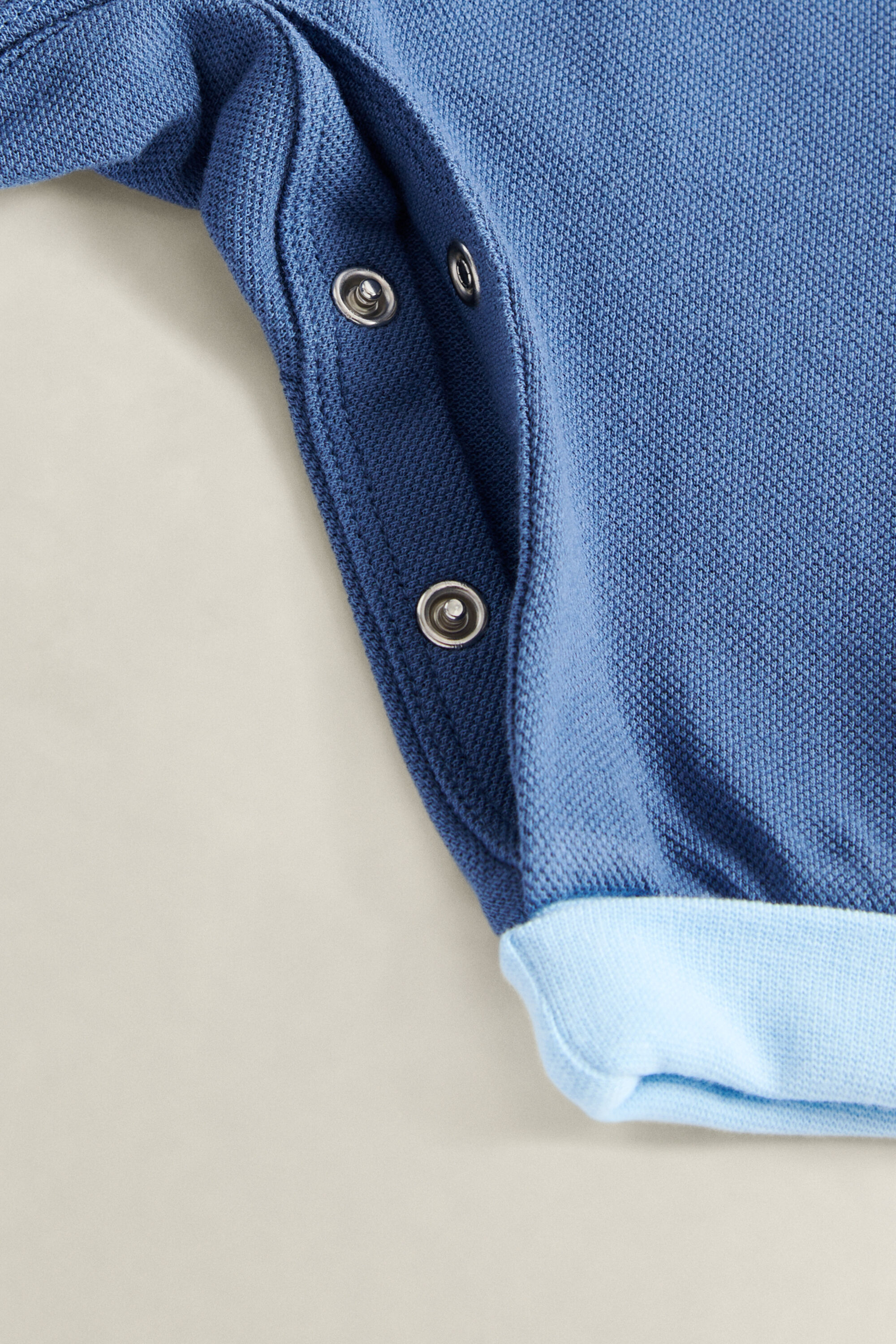 Barboteuse avec col façon polo pour bébé garçon