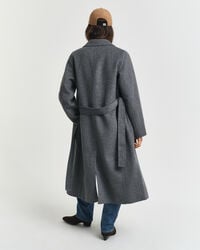 Manteau cousu main avec ceinture