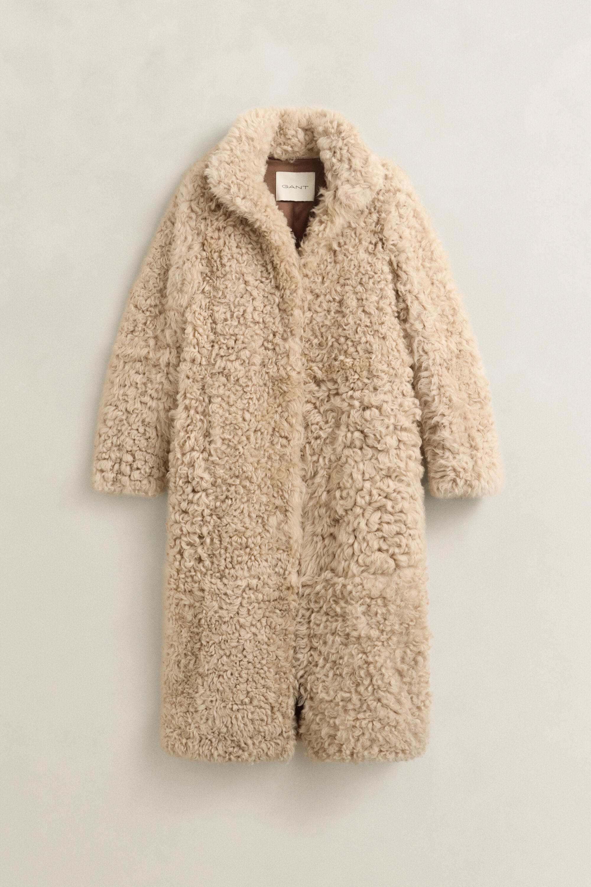 Manteau en peau lainée