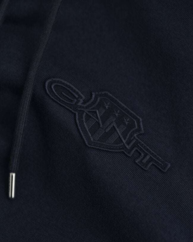 Sweat à capuche avec écusson ton sur ton