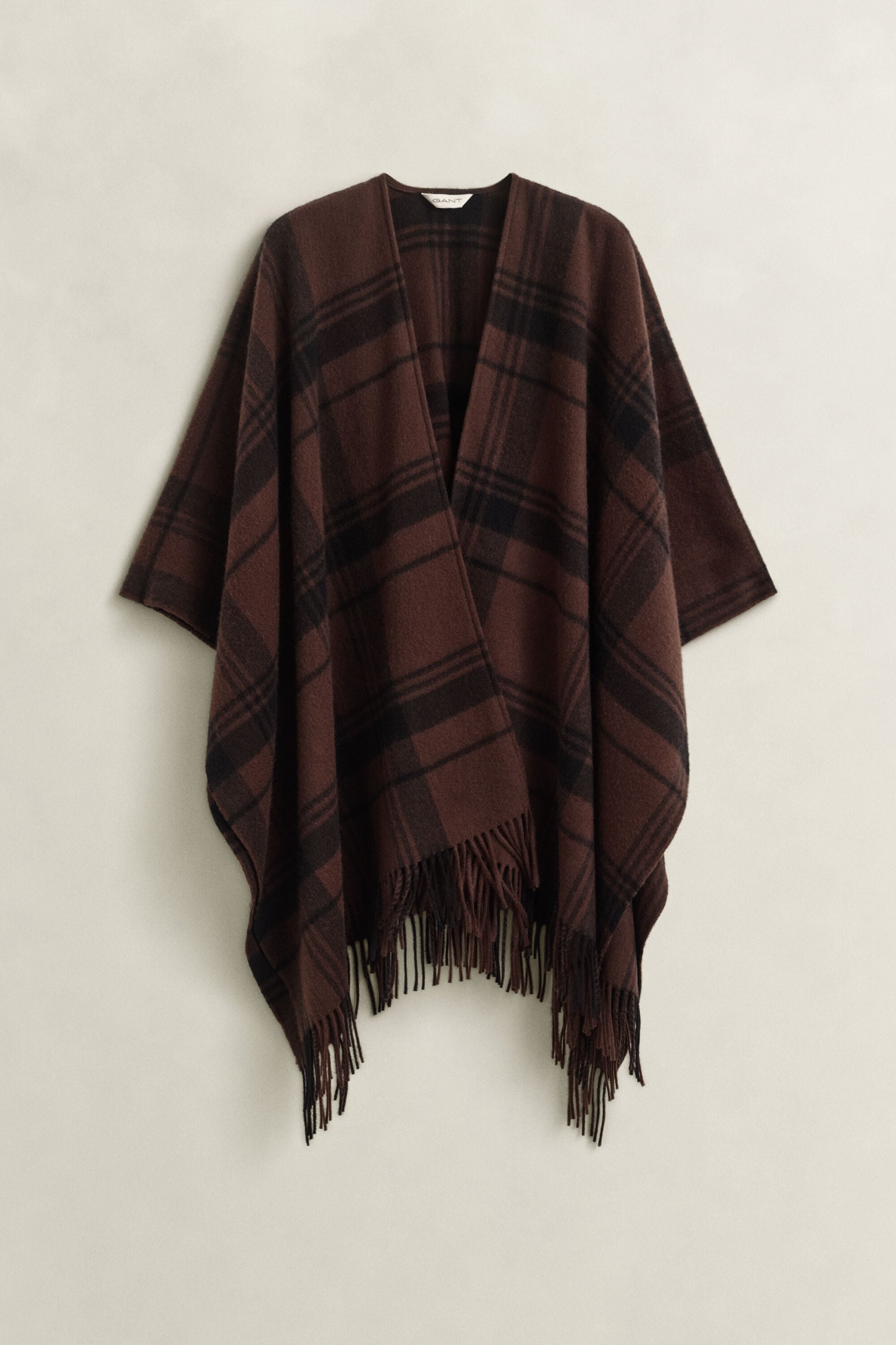 Poncho en laine à carreaux