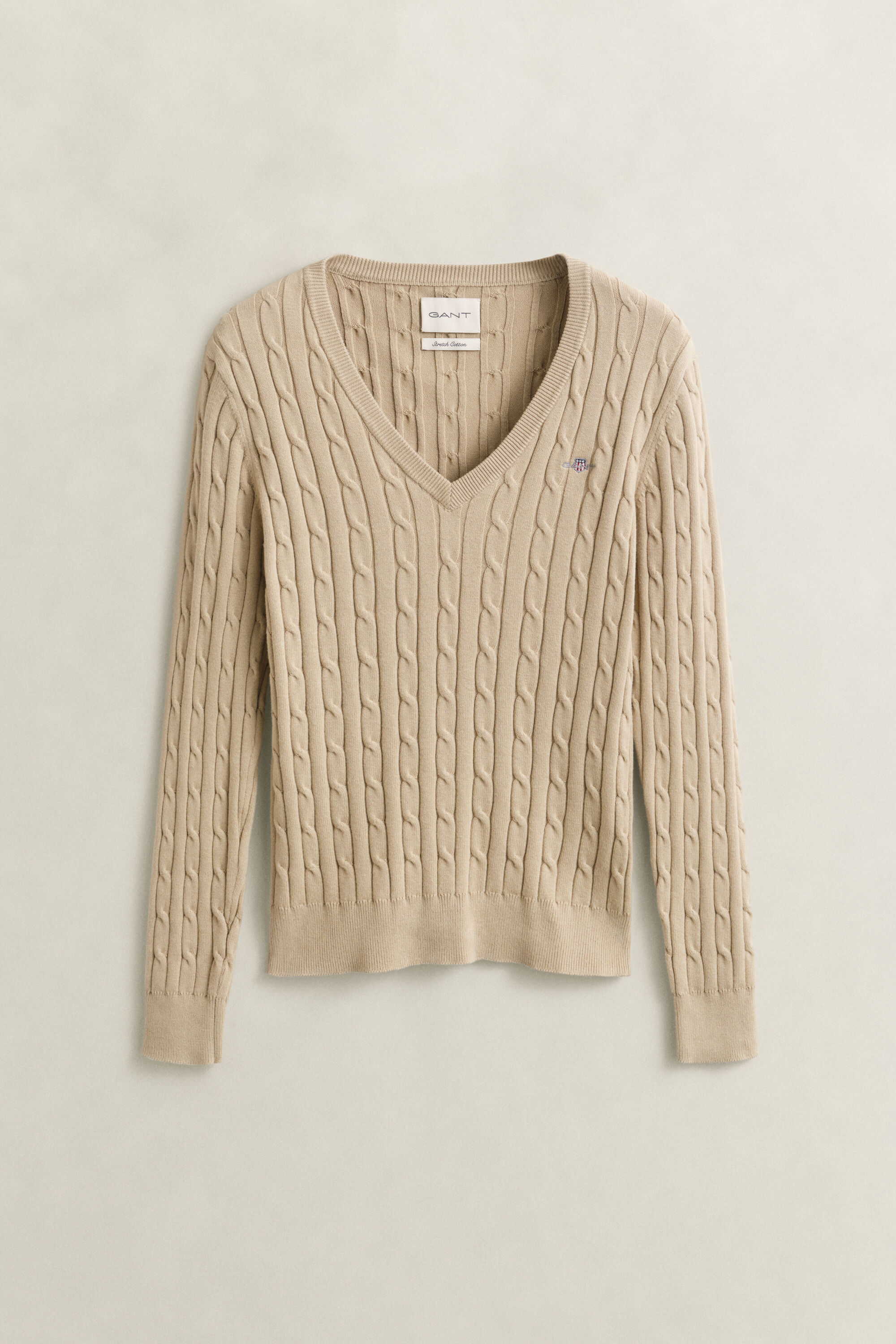 Pull col V en maille de coton stretch à torsades