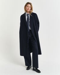 Manteau cousu main avec ceinture