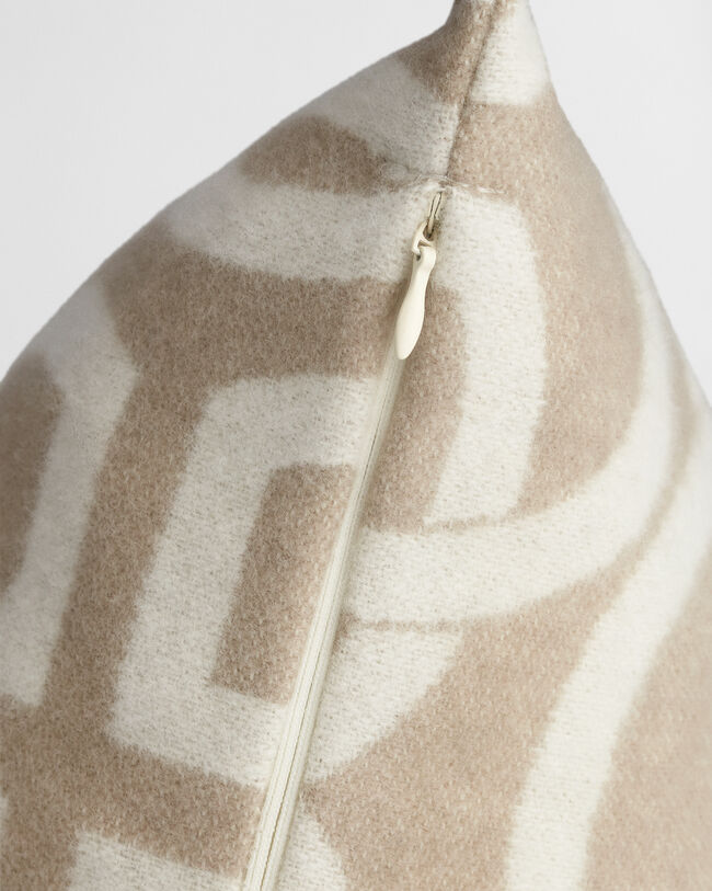 Housse de coussin en laine à monogrammes