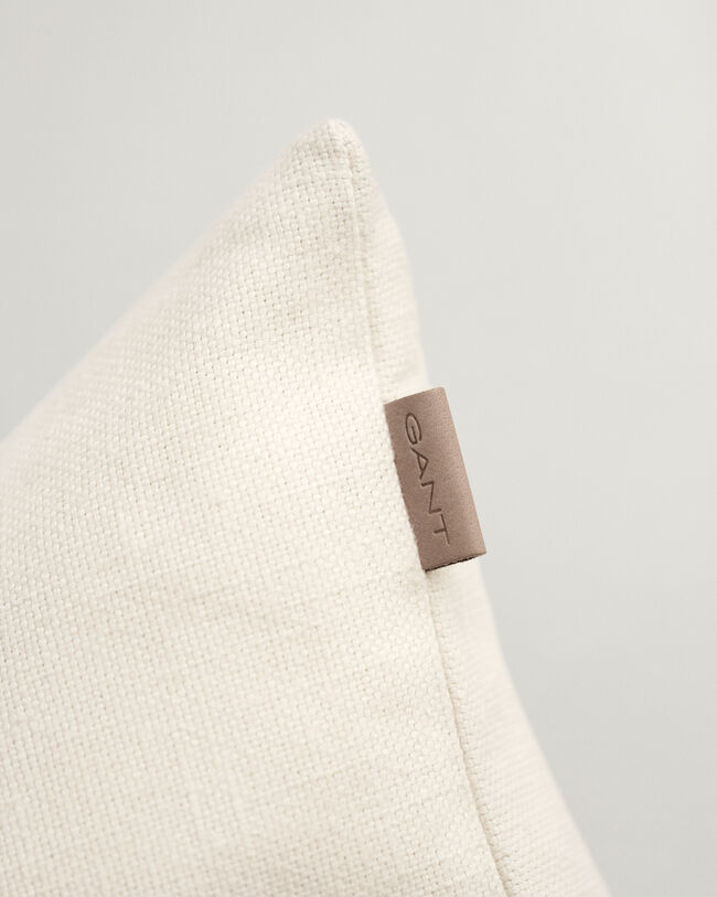 Housse de coussin Crest ton sur ton