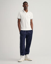 Polo en coton piqu&eacute; avec liser&eacute;s &agrave; chevrons