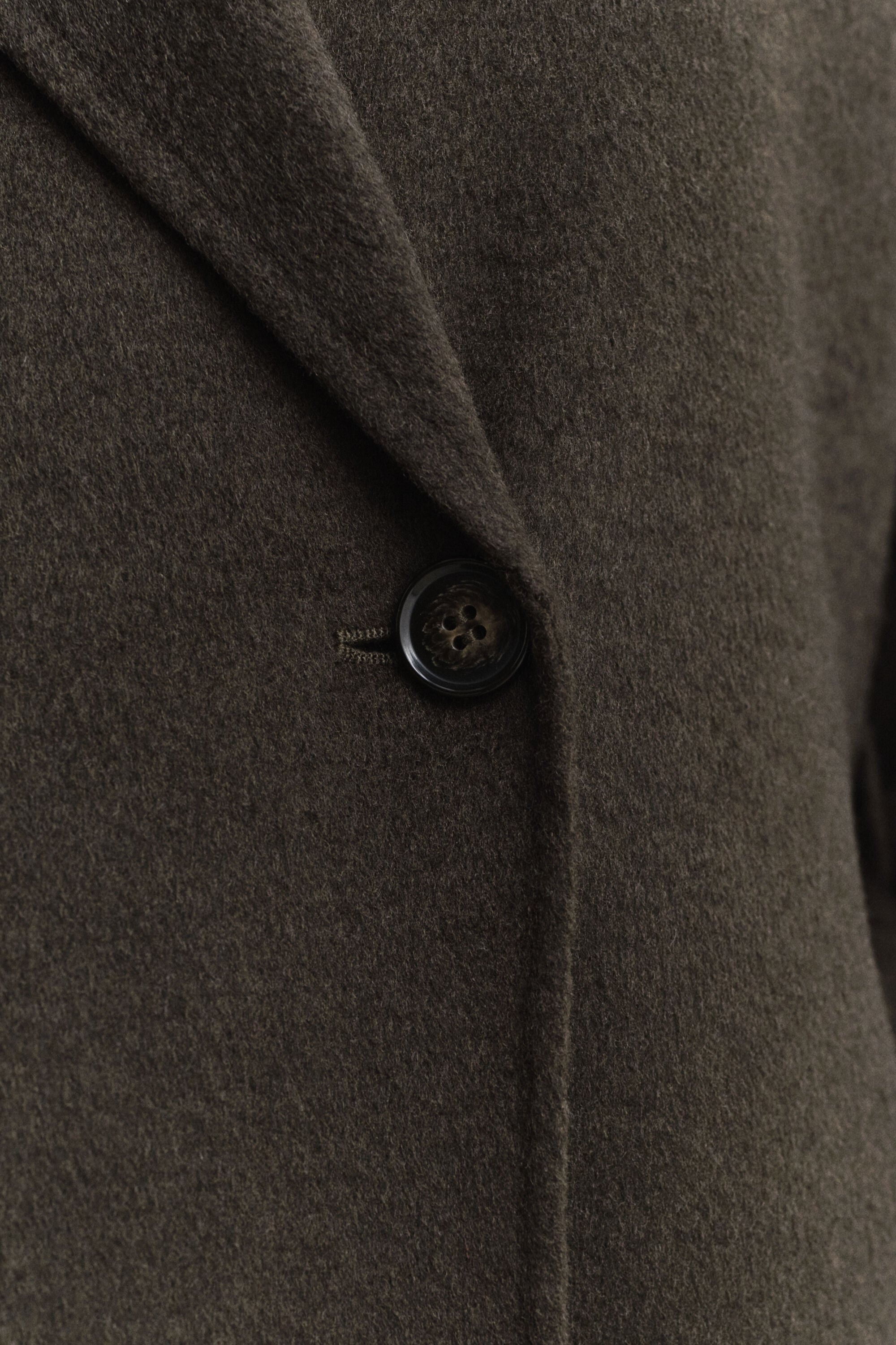 Manteau cousu main avec ceinture