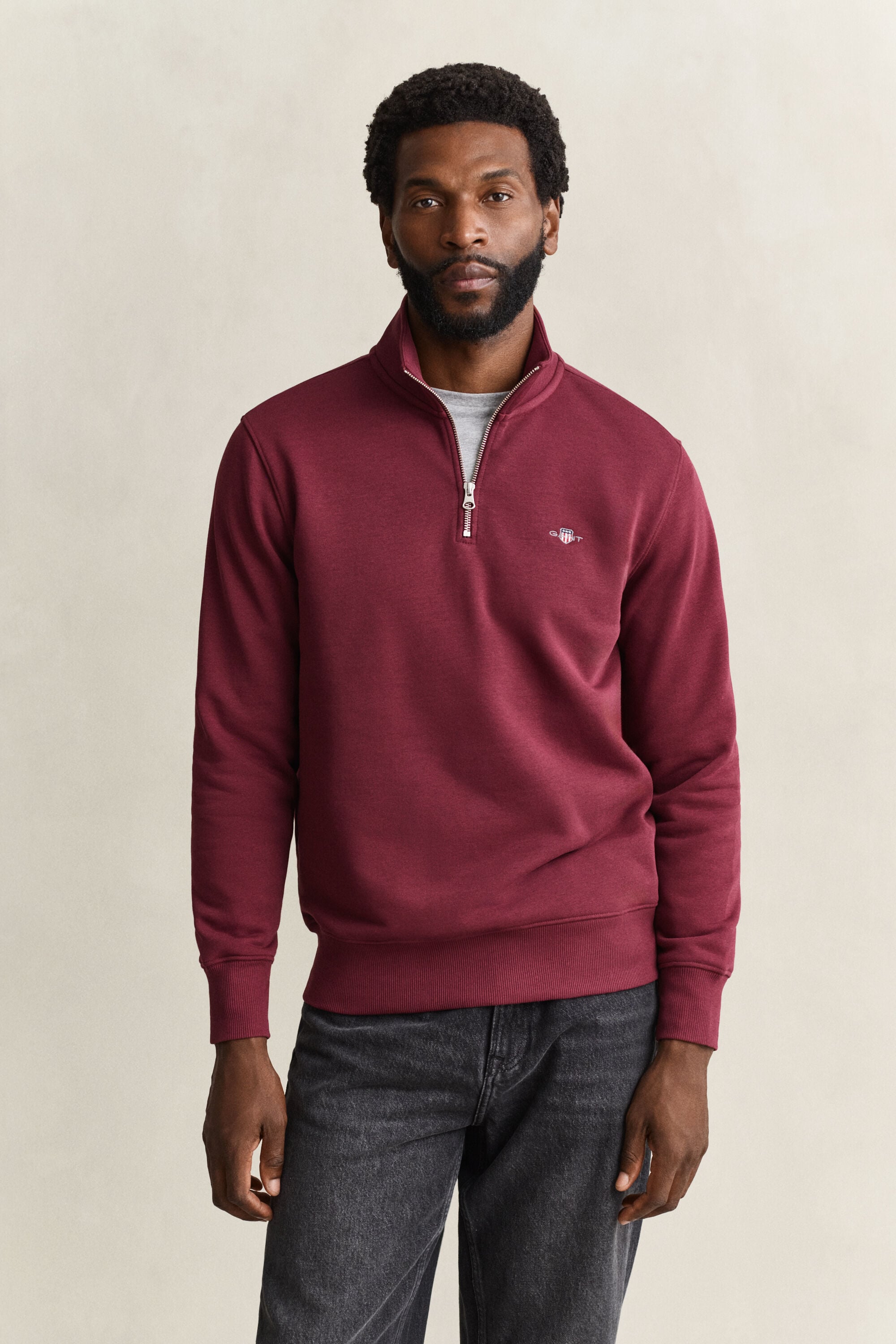 Sweat-shirt à demi-zip avec écusson