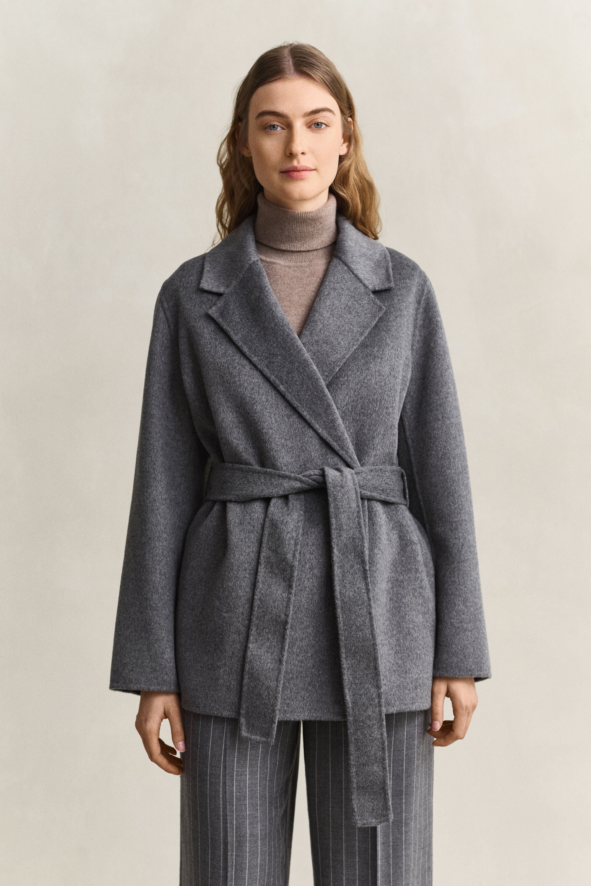 Veste cousue main avec ceinture