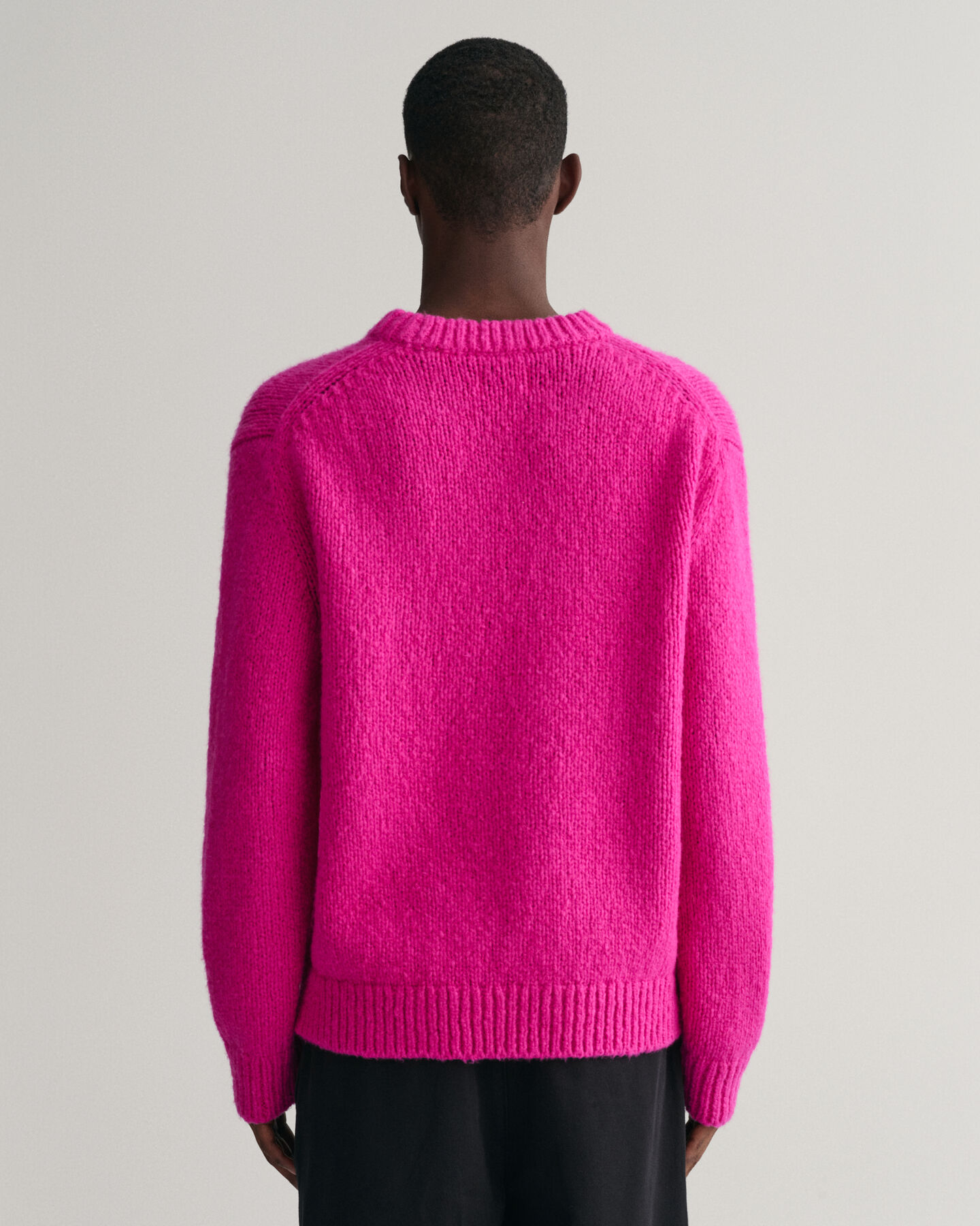 Pull ras du cou en laine bouclée