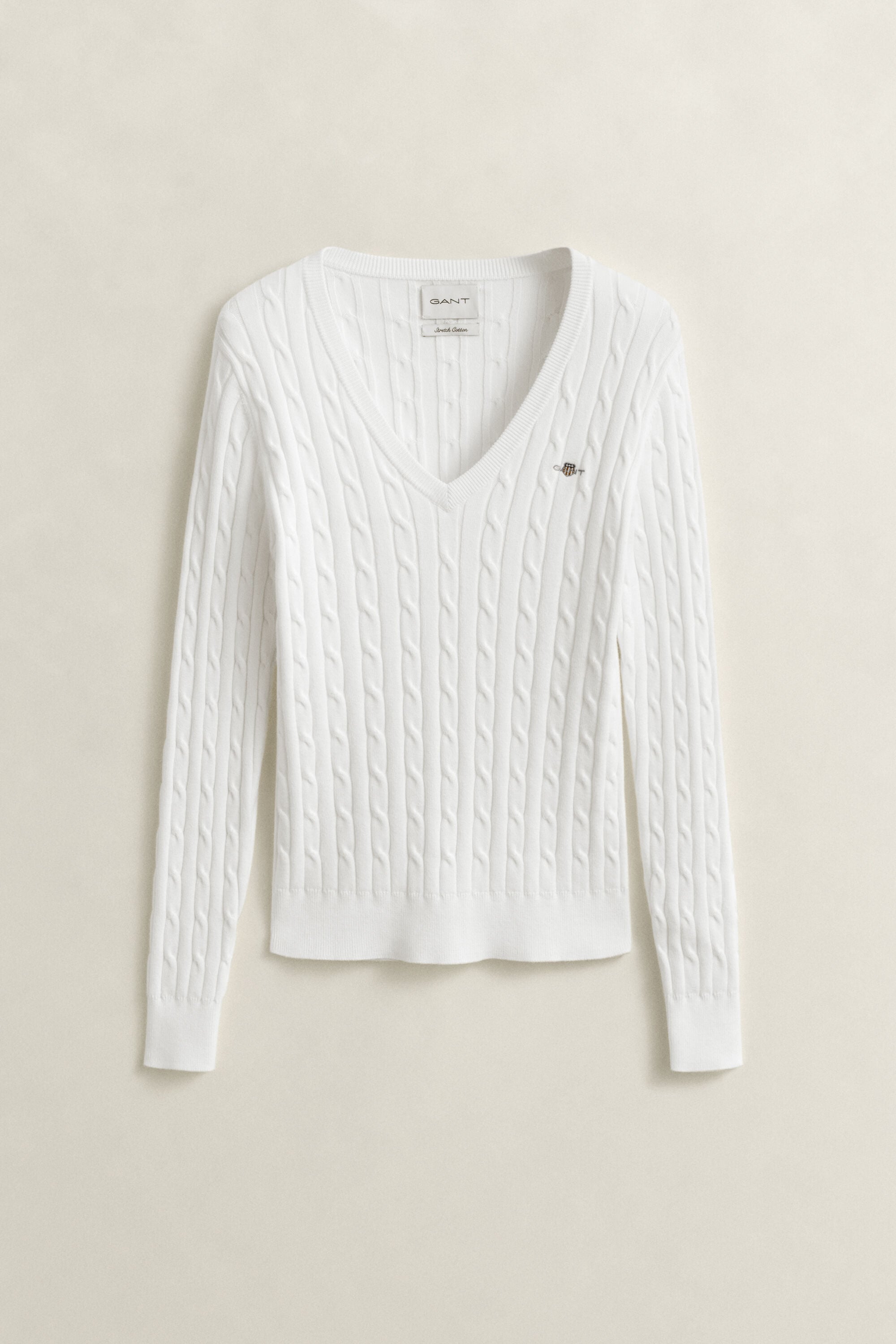 Pull col V en maille de coton stretch à torsades