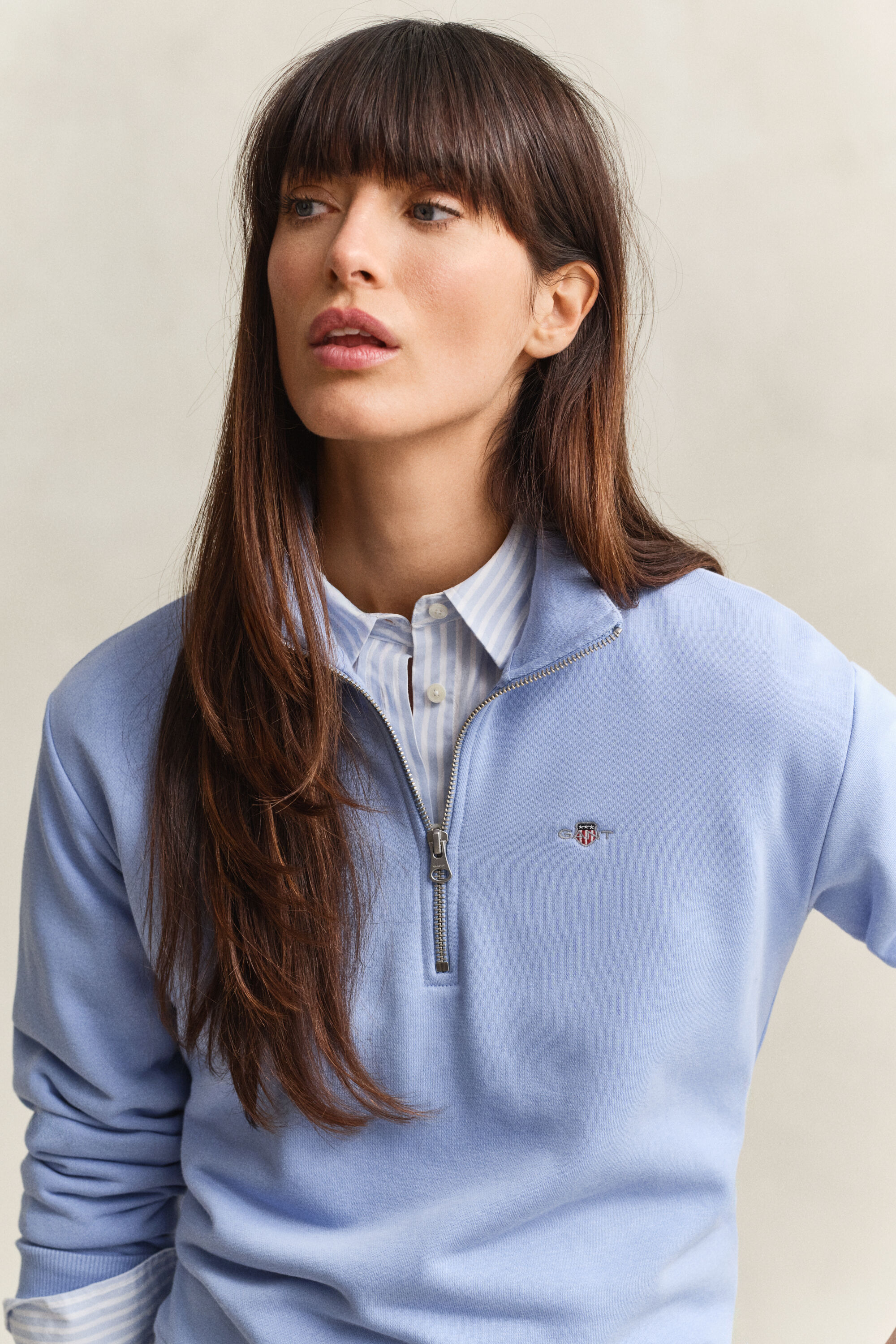 Sweat-shirt à demi-zip avec écusson