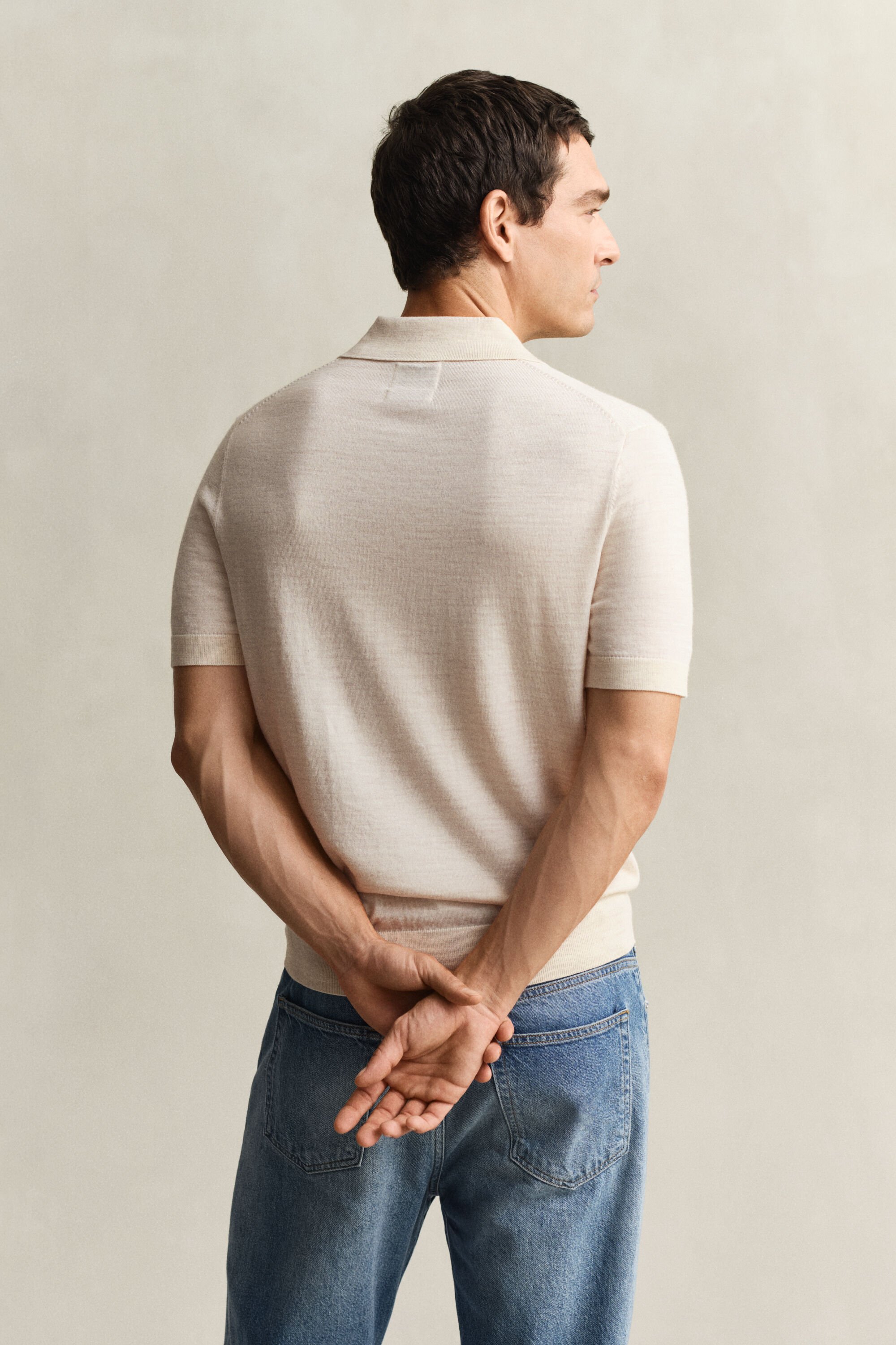 Pull façon polo en laine mérinos extrafine à manches courtes