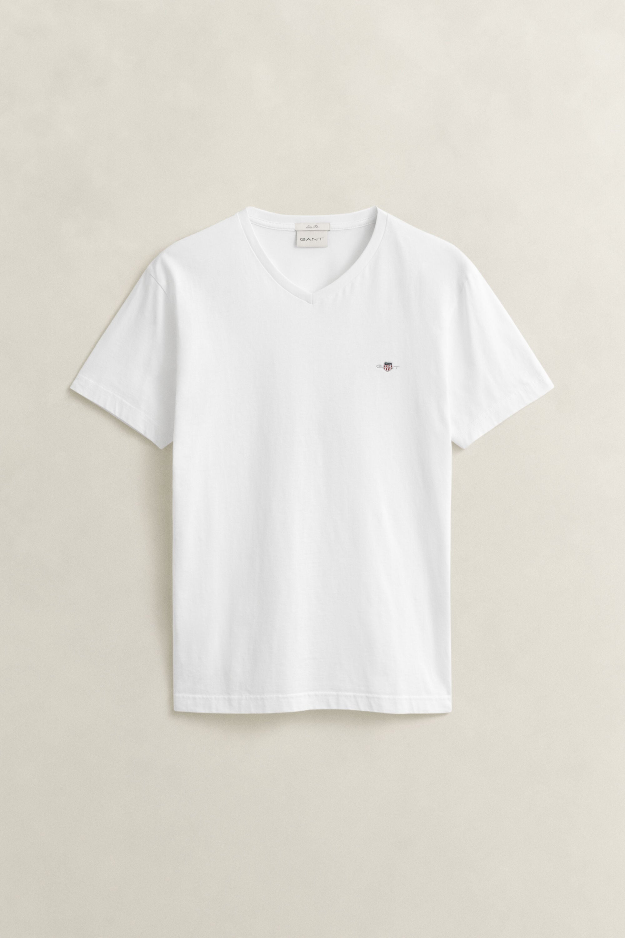 T-shirt col V avec écusson