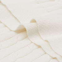 Pull col roulé en coton stretch à torsades