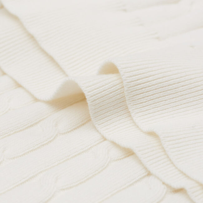 Pull col roulé en coton stretch à torsades