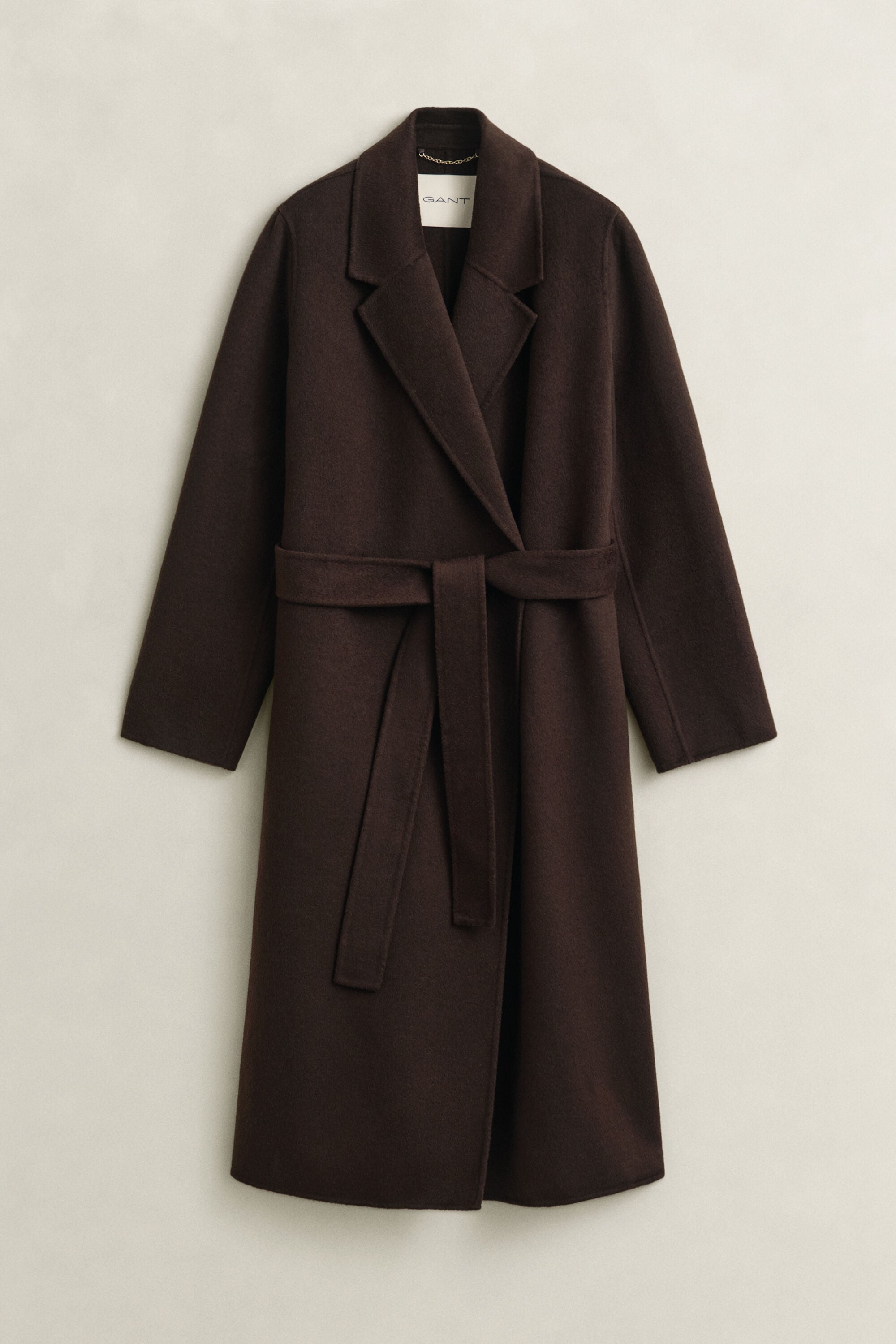 Manteau cousu main avec ceinture