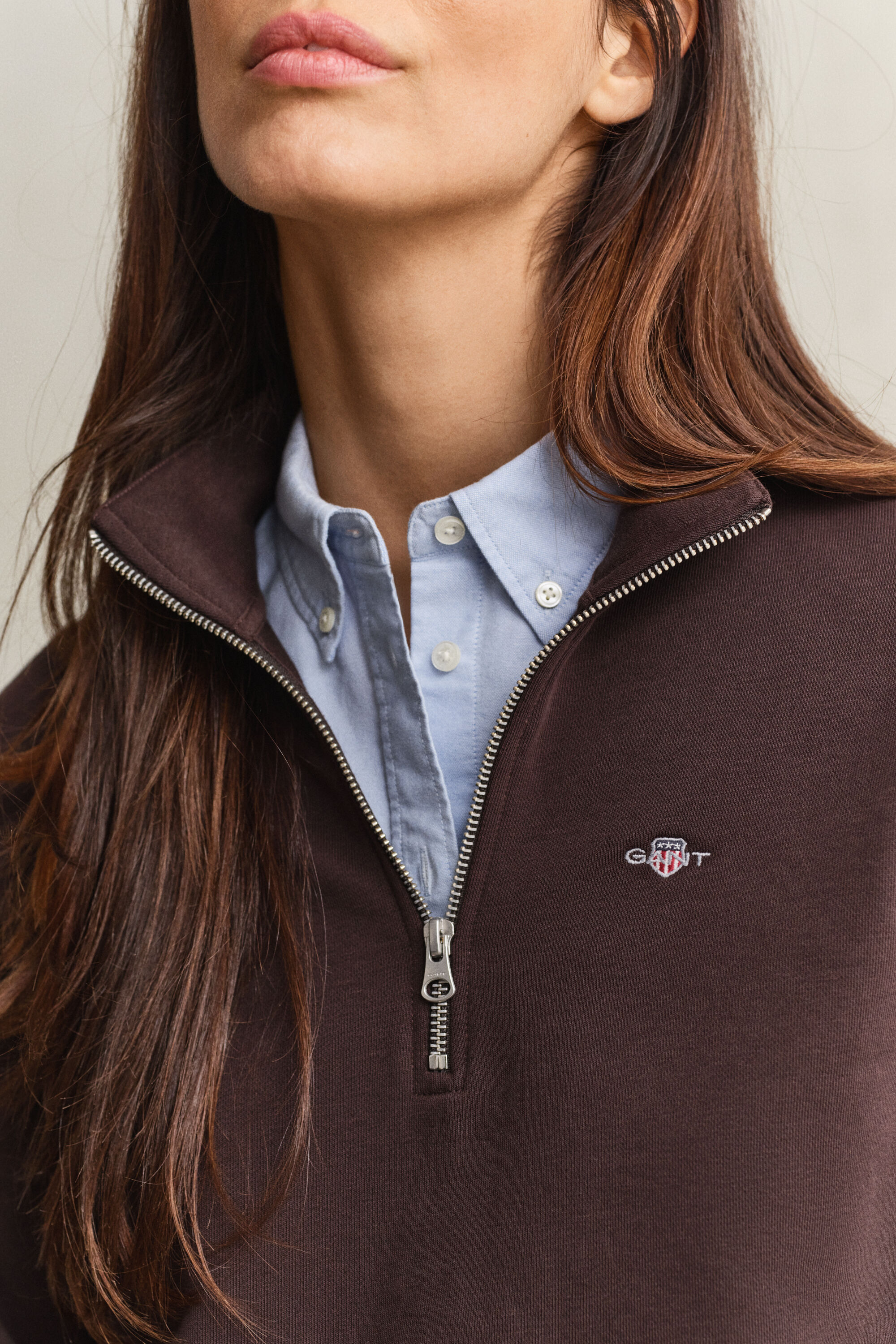 Sweat-shirt à demi-zip avec écusson