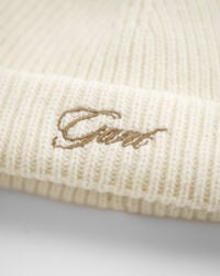 Bonnet avec rabats d'oreilles et pompon Bébé