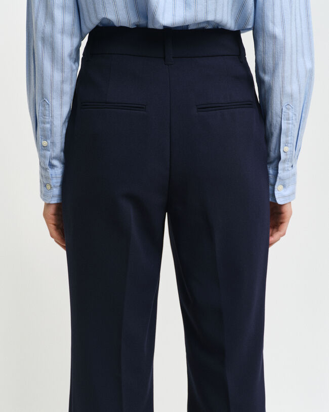Pantalon habillé coupe slim évasé