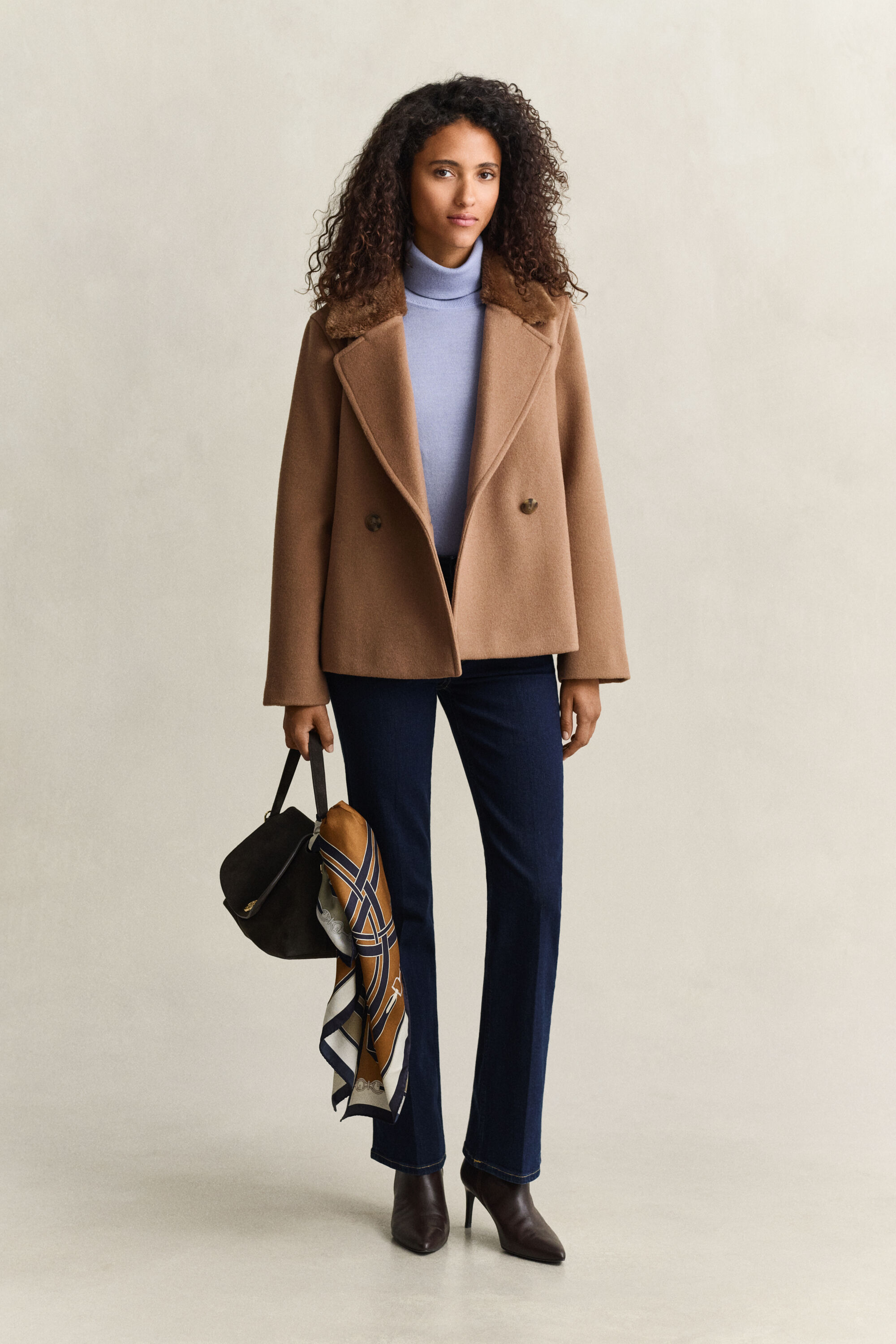 Veste avec col en fourrure synthétique