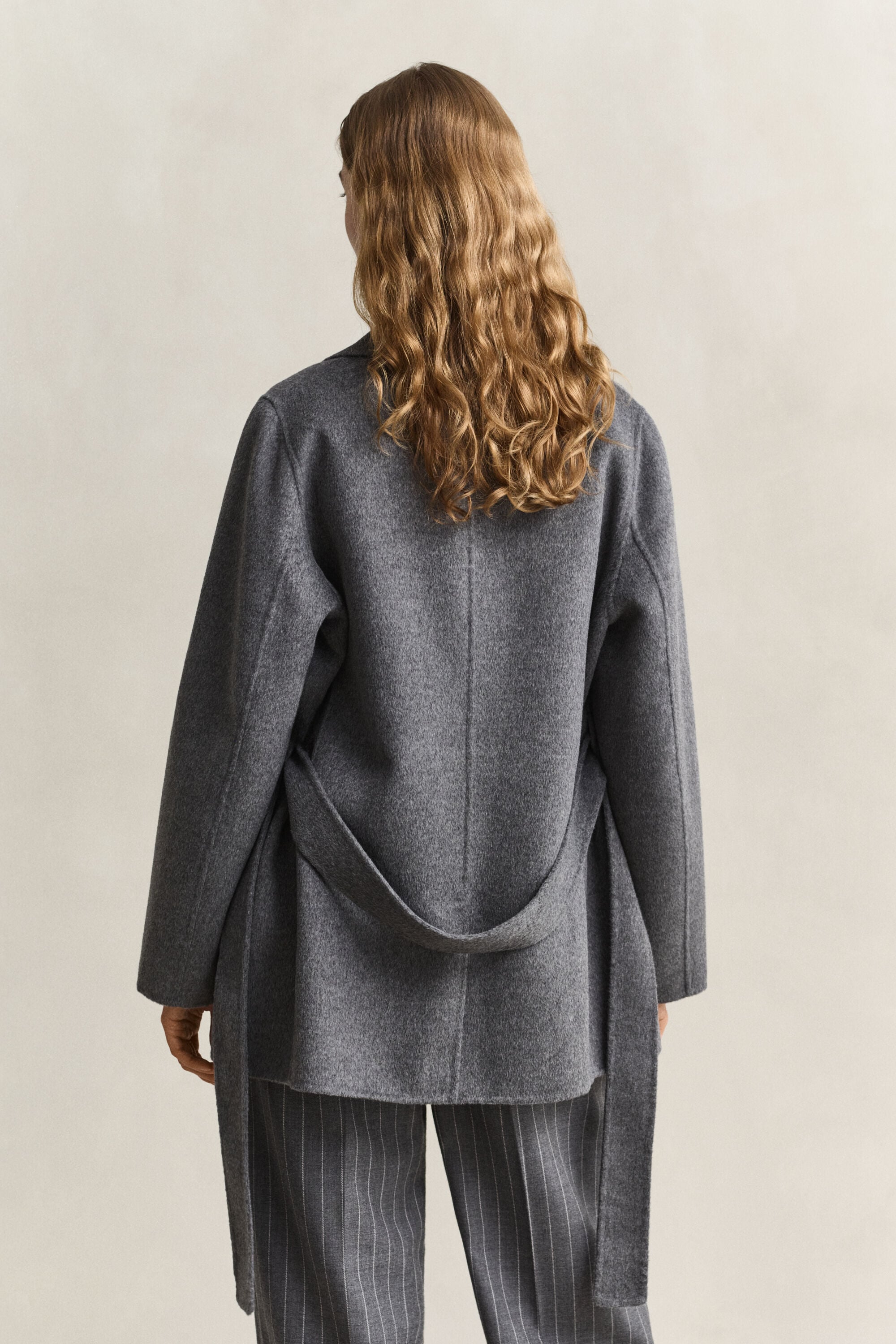 Veste cousue main avec ceinture