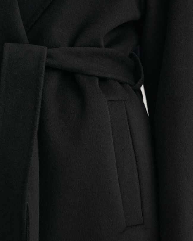 Manteau cousu main avec ceinture