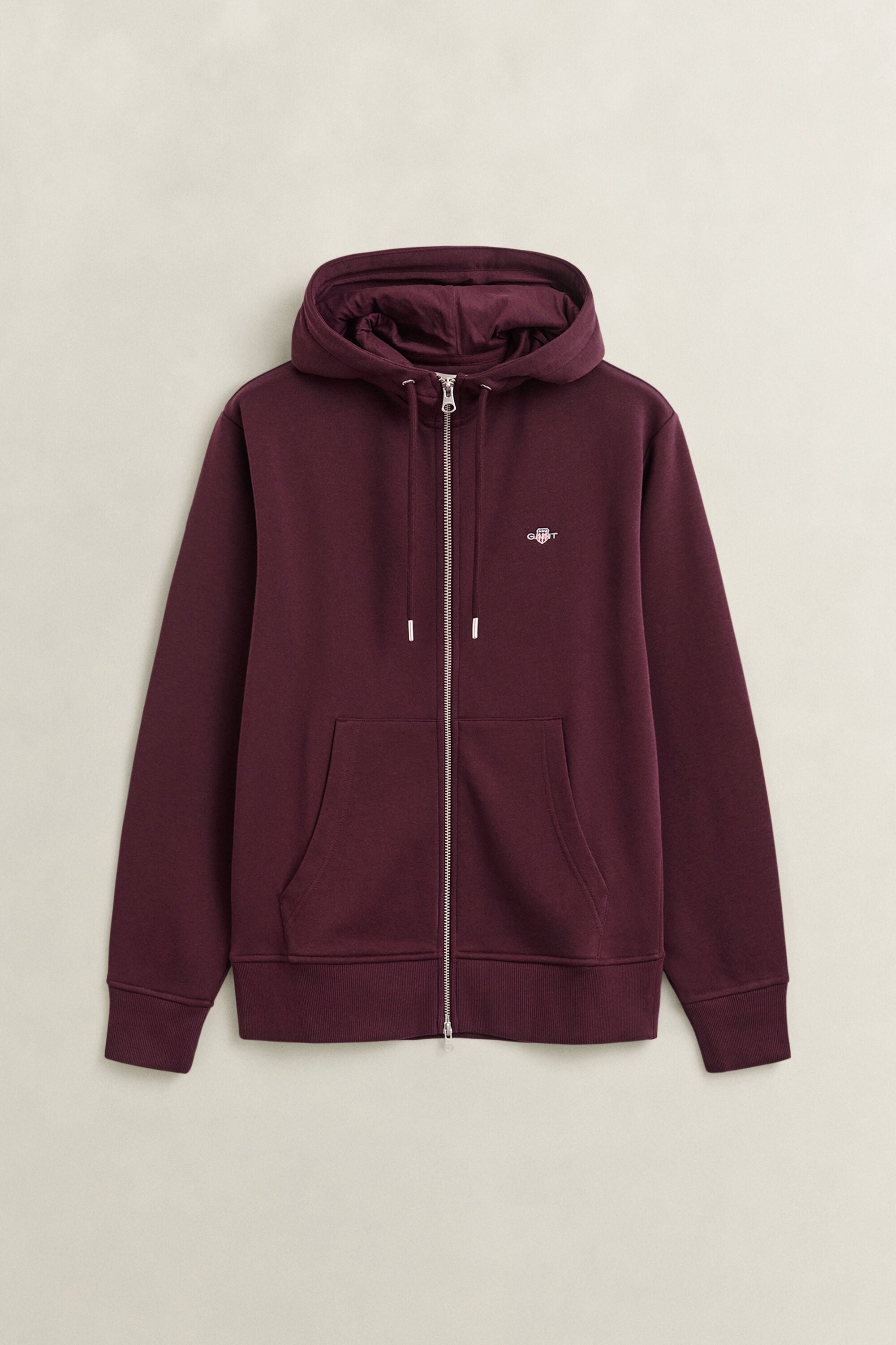 Sweat à capuche zippé avec écusson