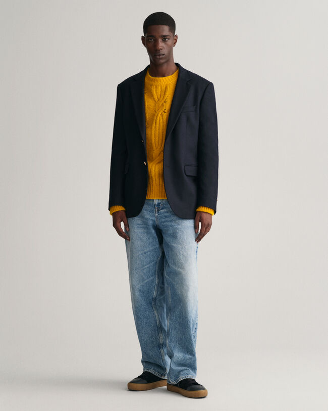 Pull ras du cou en maille torsadée duveteuse