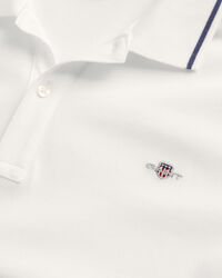 Polo en coton piqu&eacute; avec liser&eacute; Teens