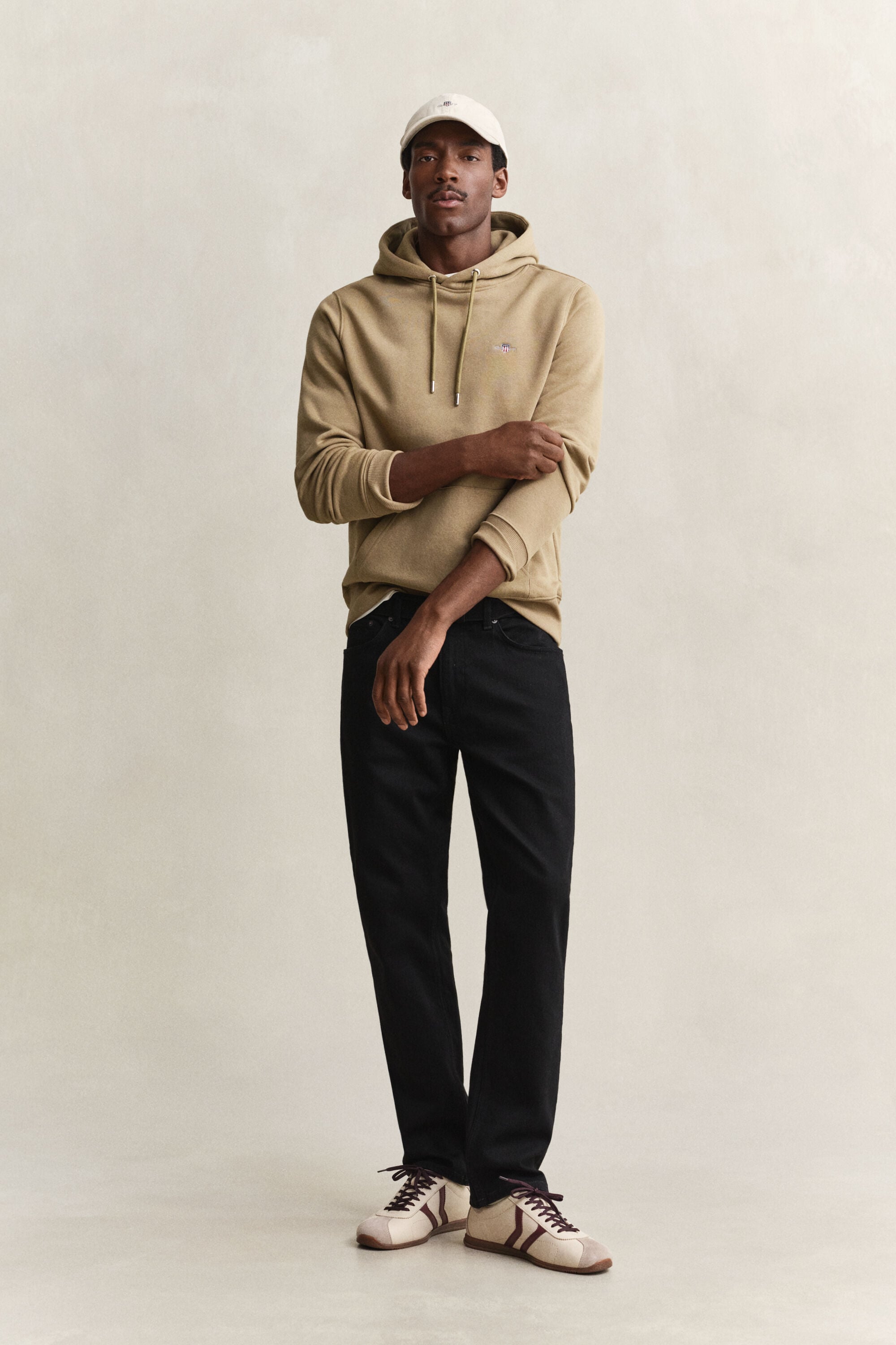 Sweat à capuche avec écusson