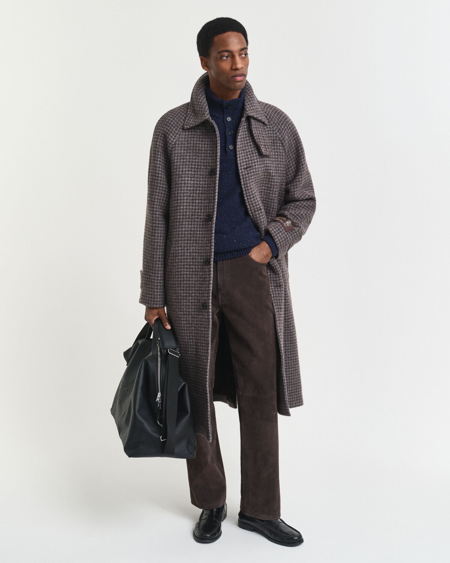 Pull semi-boutonné en laine mélangée mouchetée