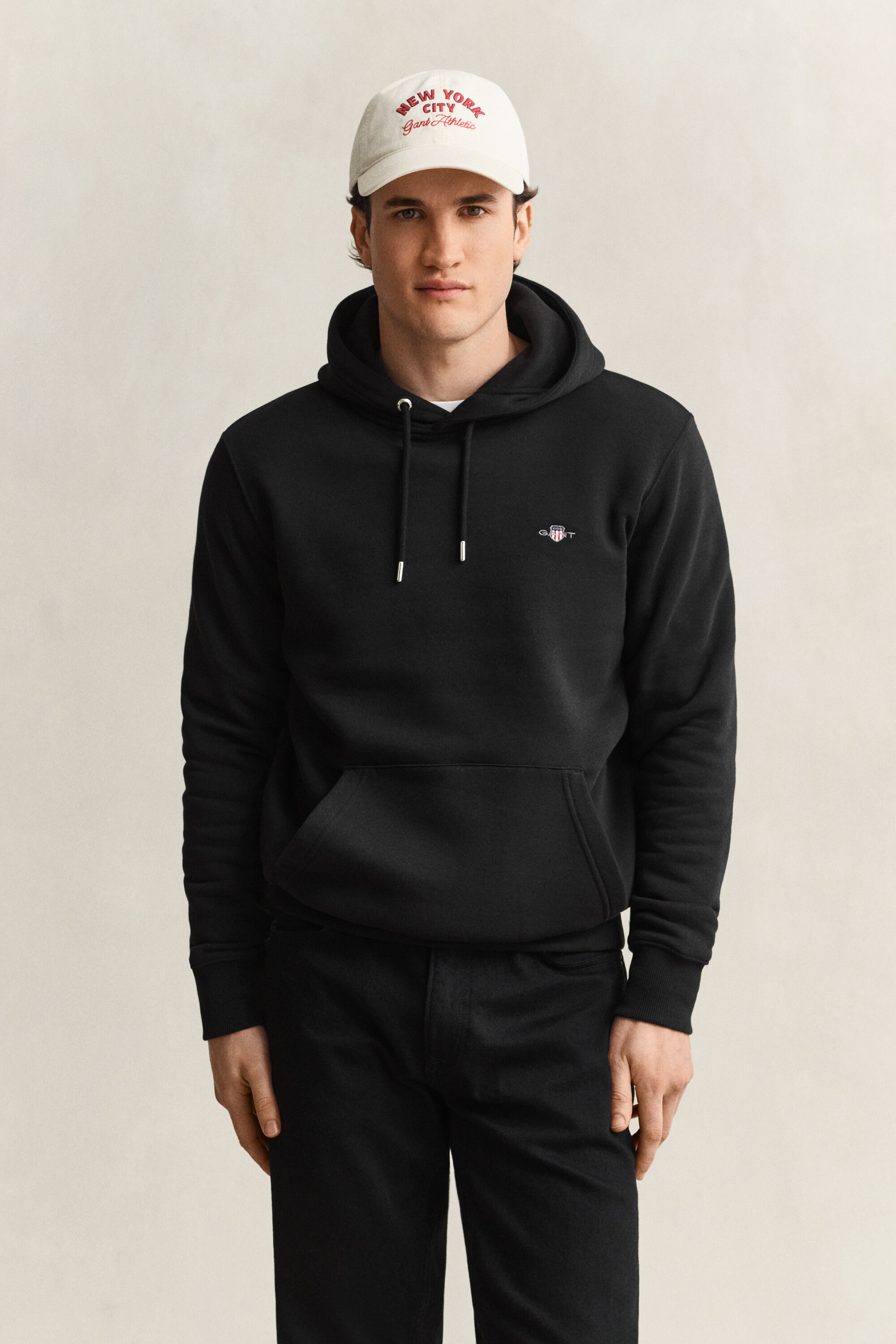 Sweat à capuche avec écusson