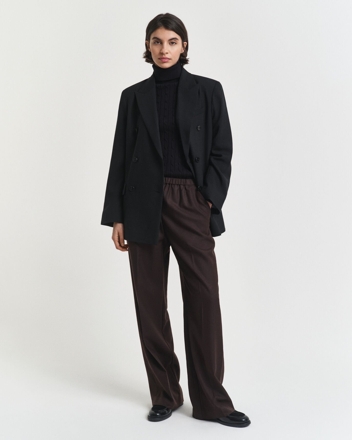 Pull col roulé en maille de coton stretch à torsades