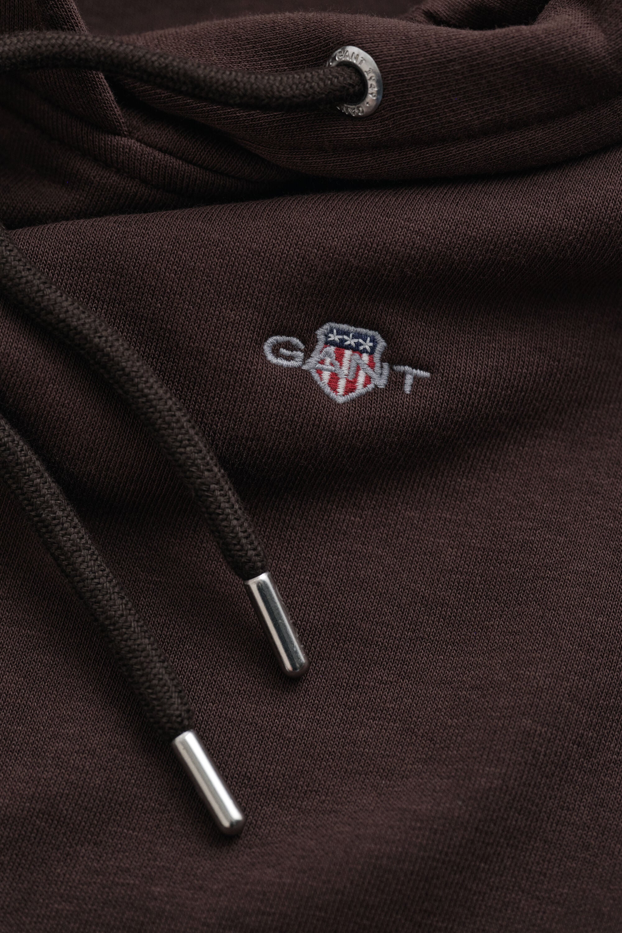 Sweat à capuche avec écusson