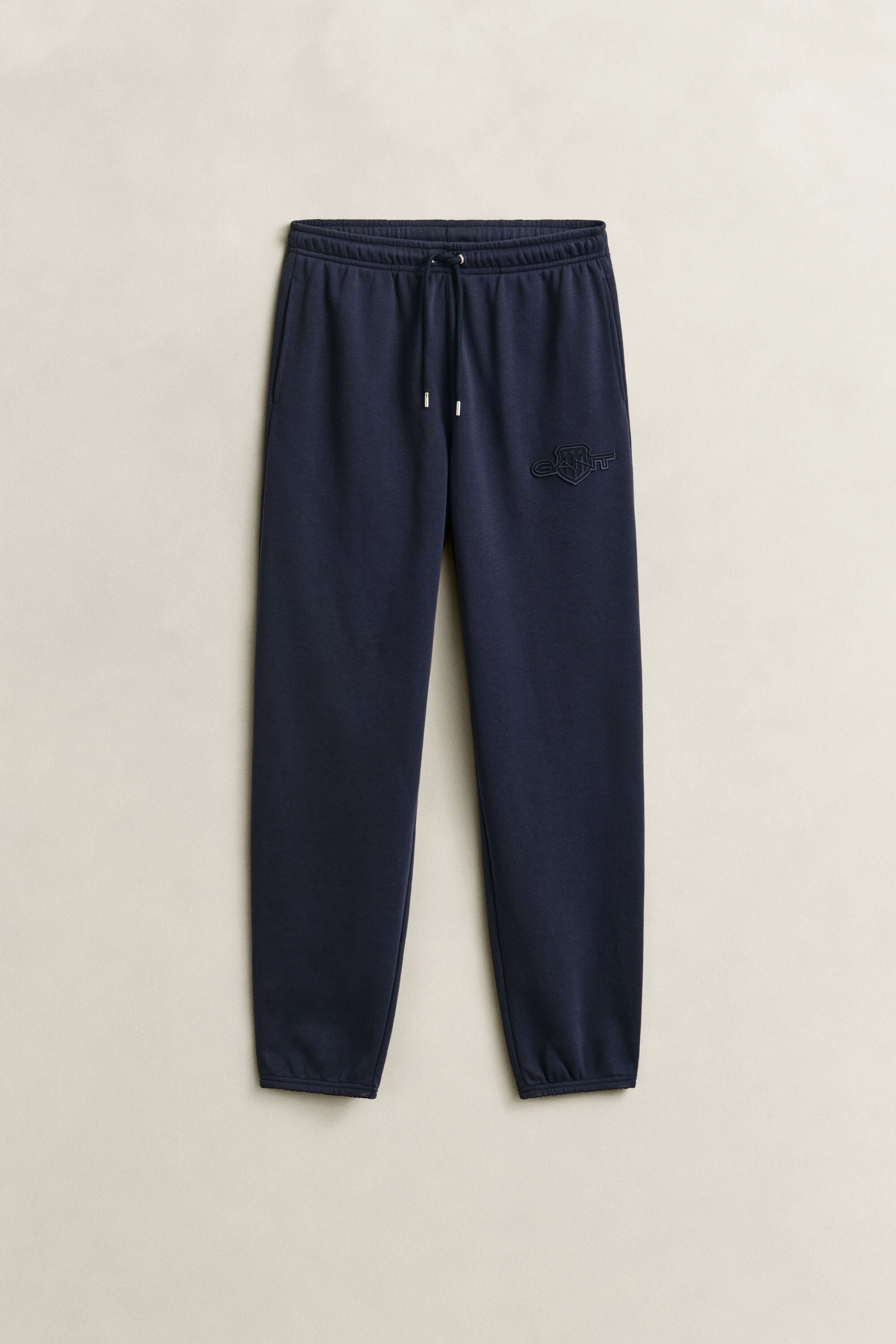 Pantalon de jogging avec écusson ton sur ton
