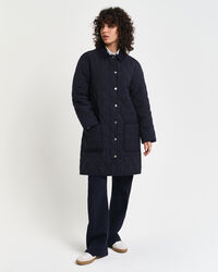 Manteau matelassé avec finitions en velours côtelé