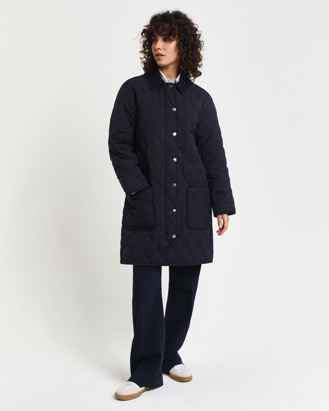 Manteau matelassé avec finitions en velours côtelé