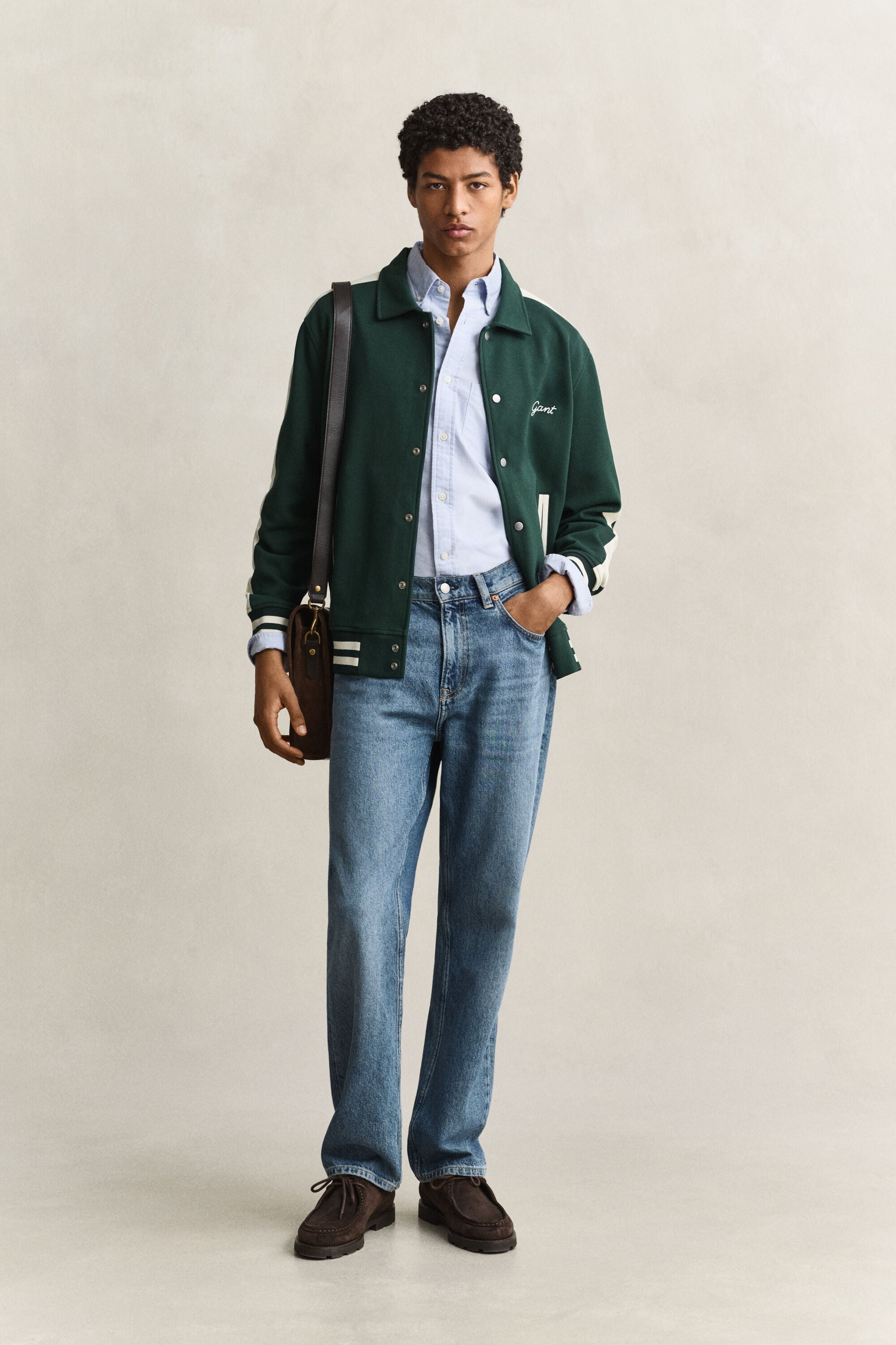 Veste boutonnée en maille interlock.