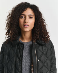 Manteau matelassé avec bord en velours côtelé