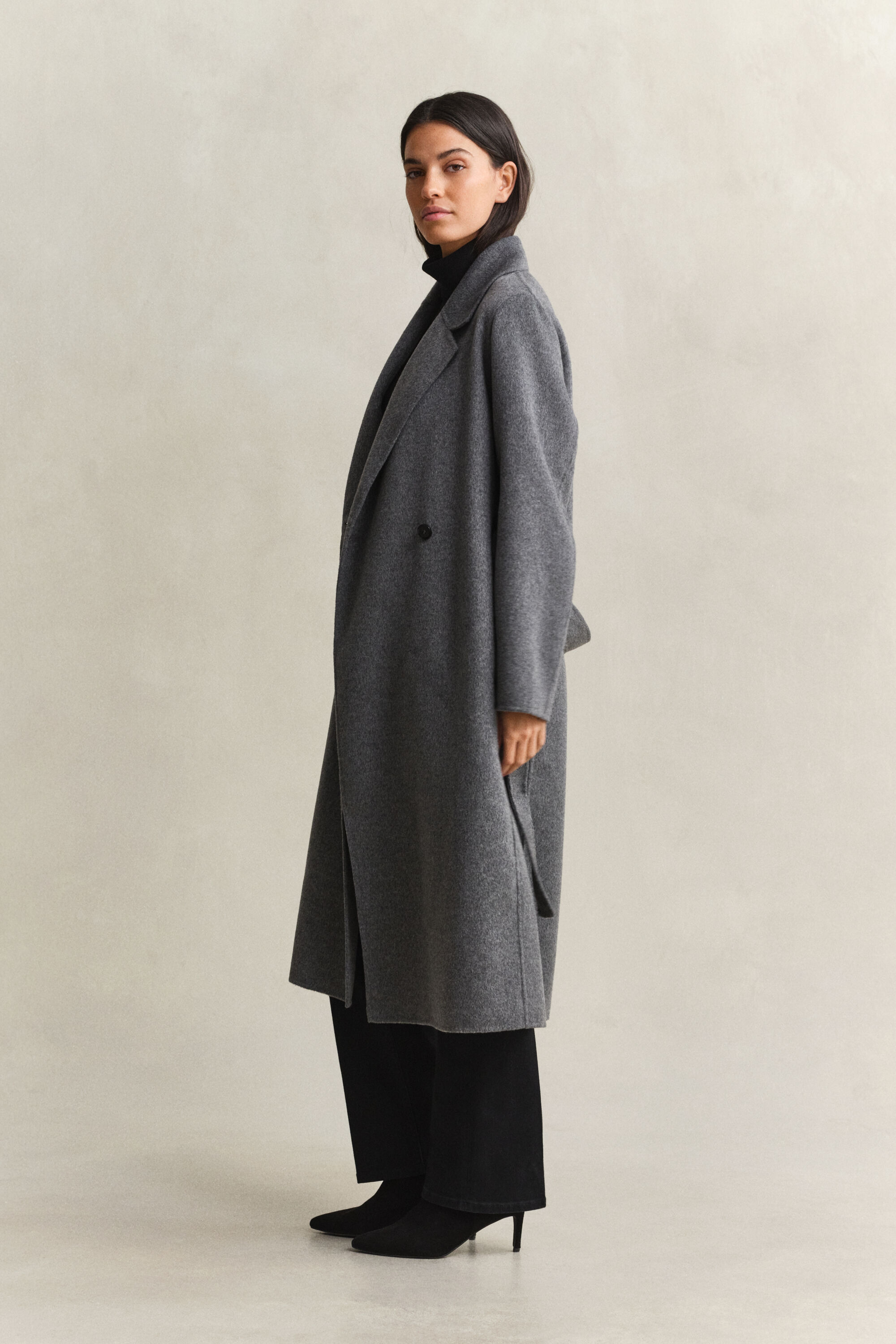 Manteau cousu main avec ceinture